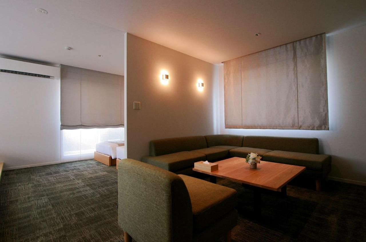 Апарт отель Grand Base Okayama Ekimae Экстерьер фото