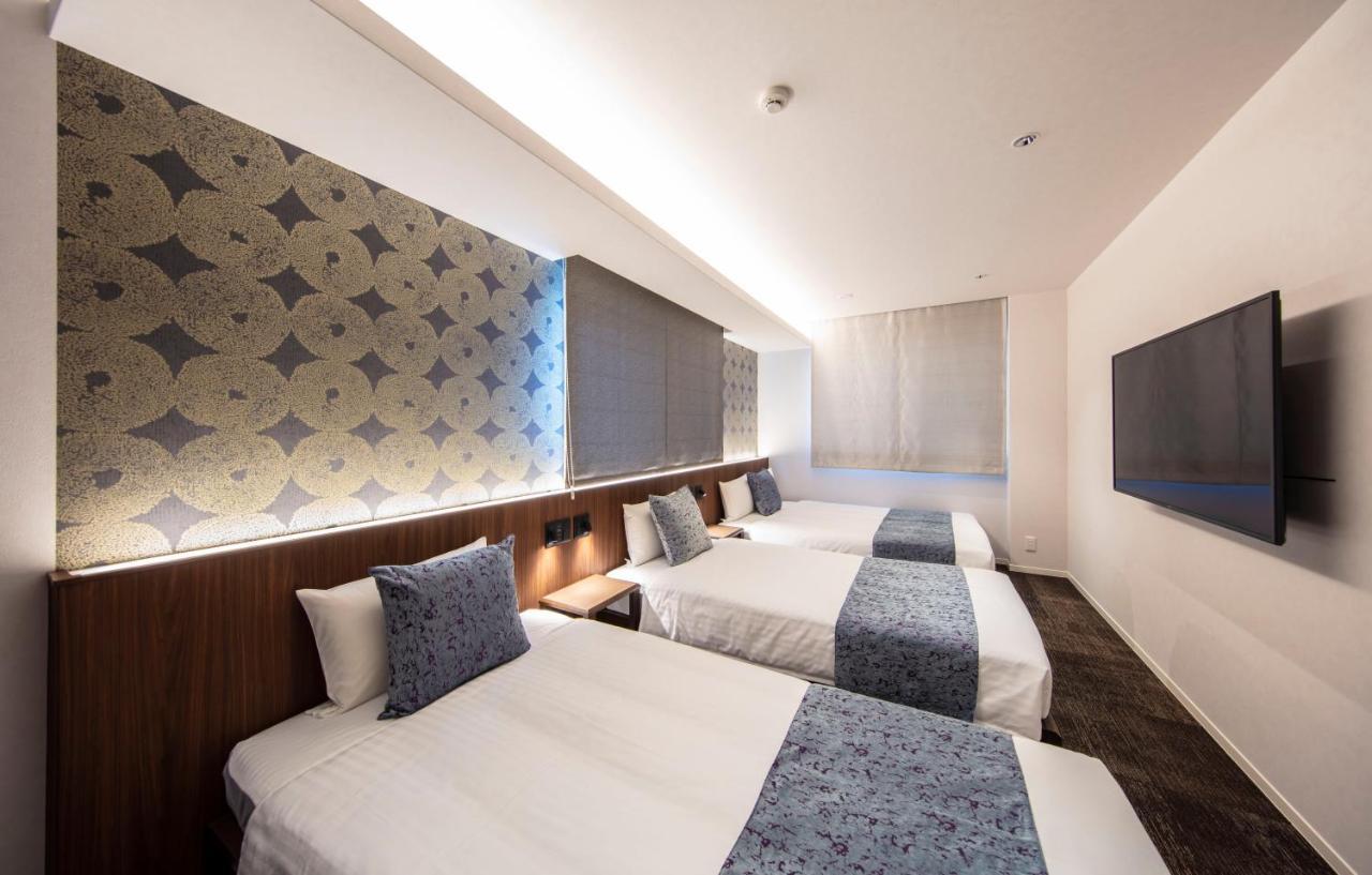 Апарт отель Grand Base Okayama Ekimae Экстерьер фото