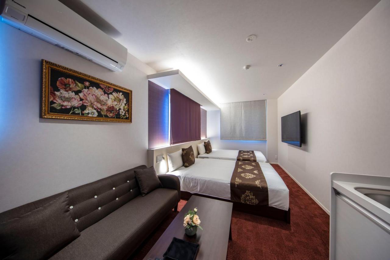Апарт отель Grand Base Okayama Ekimae Экстерьер фото