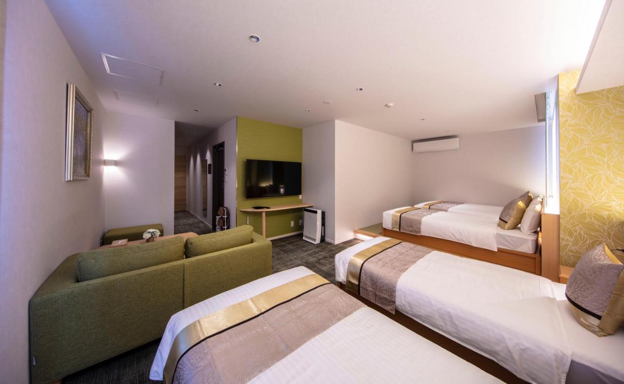 Апарт отель Grand Base Okayama Ekimae Экстерьер фото