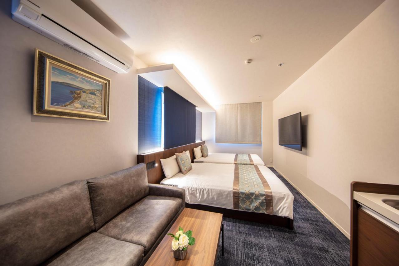 Апарт отель Grand Base Okayama Ekimae Экстерьер фото