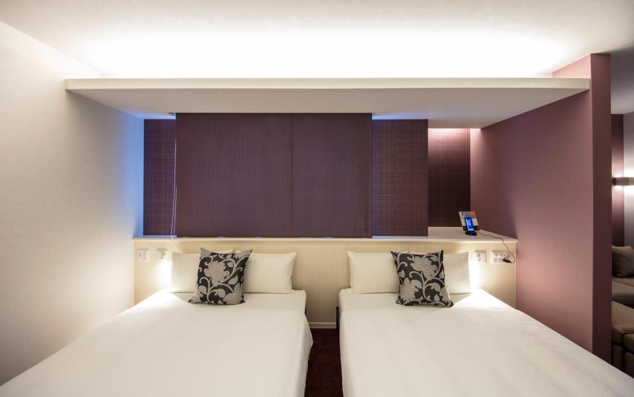 Апарт отель Grand Base Okayama Ekimae Экстерьер фото